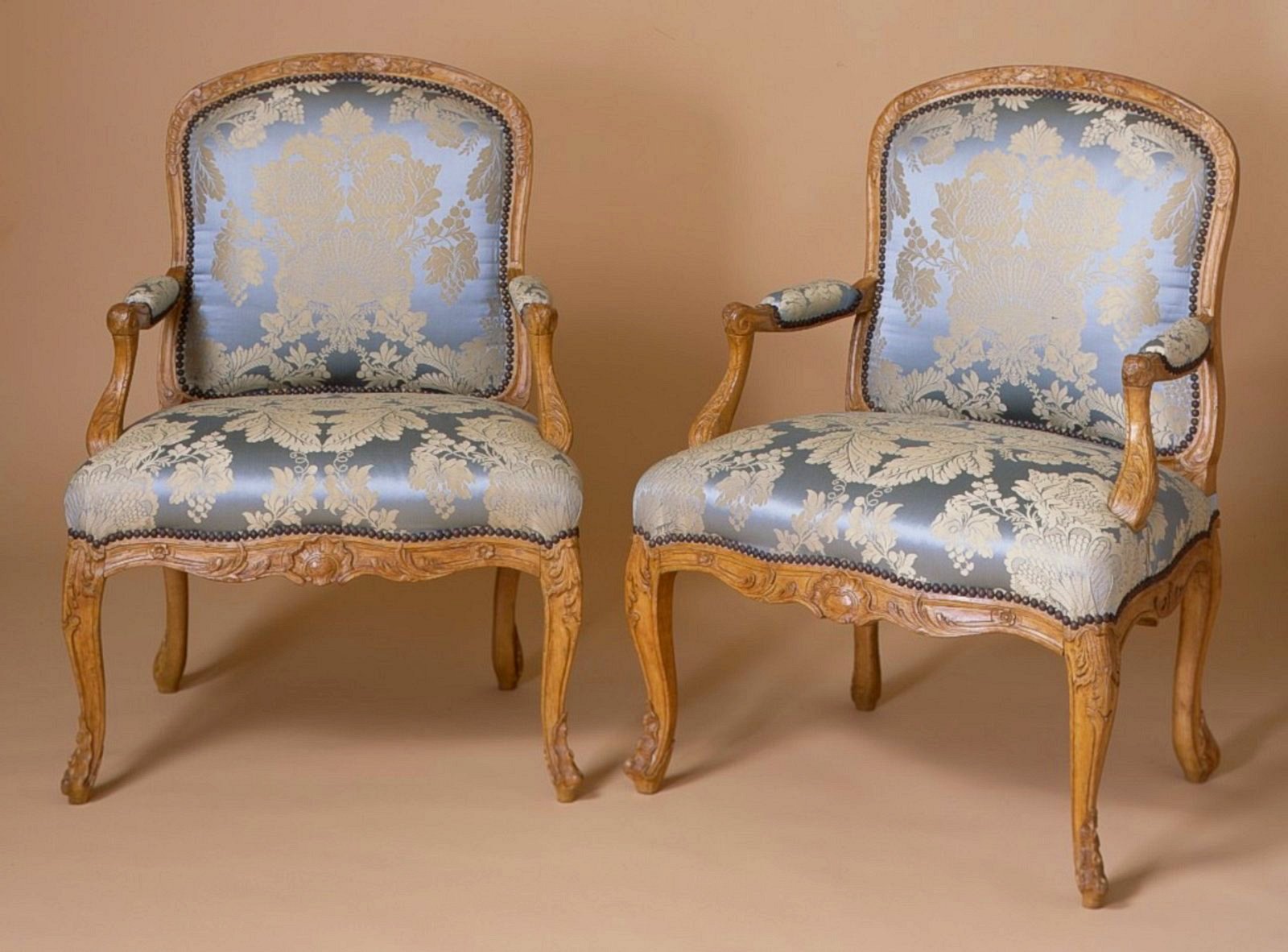 Pair of French Régence Period, Beechwood Fauteuils